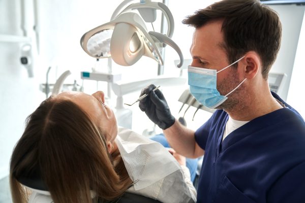 Woman having visit at dentist